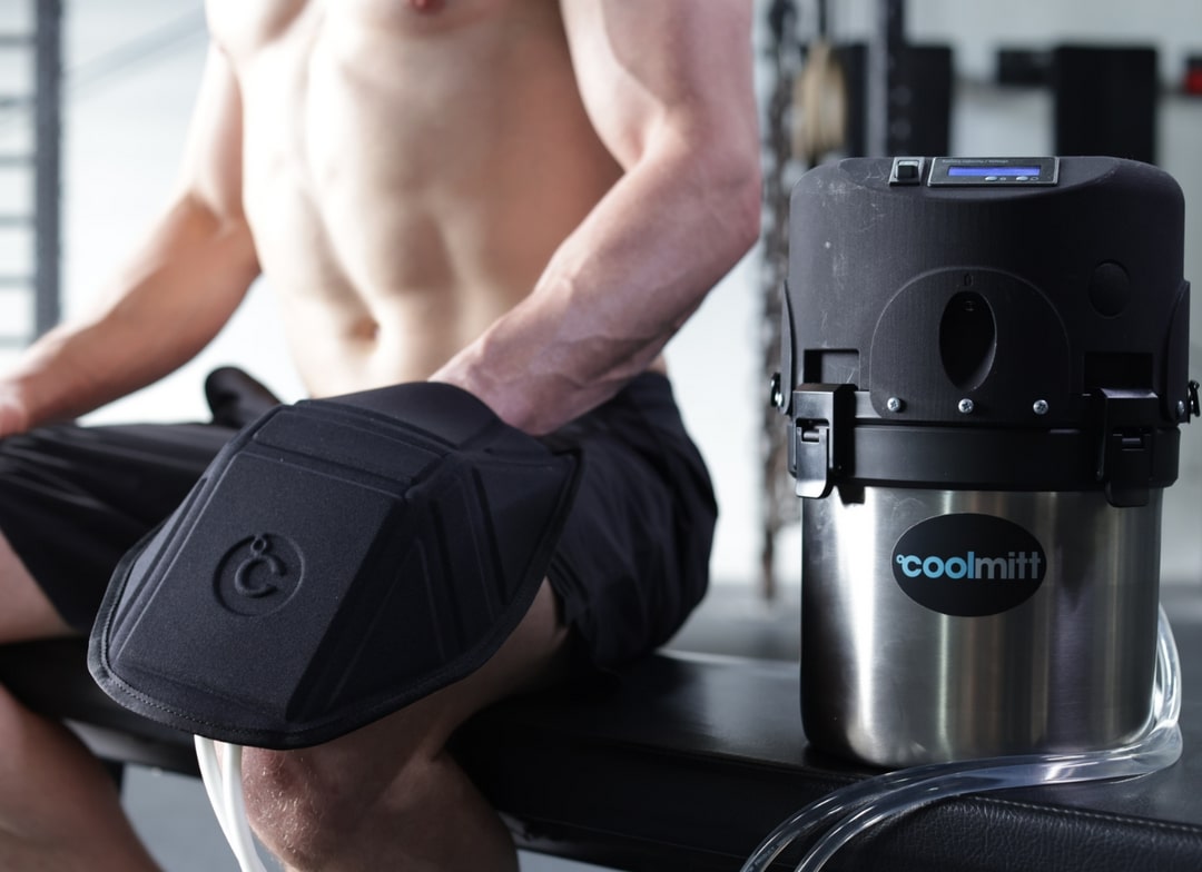 The CoolMitt® device chills water to the ideal cool-but-not-too-cold temperature and circulates it to a cooling pad where you have placed your hand.